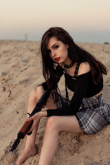 Girl with a gun in her hands