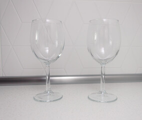 empty champagne wine glass on isolated white background. mockup for drinks and juices. crockery, transparent glass for juice cocktails