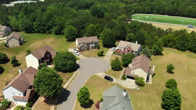 Aerial view of suburbs with house and park