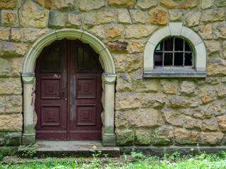 View of the stone wall with a window and a door, Lower Silesia, Poland