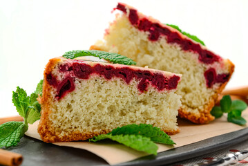 Sponge cake with cherries and cinnamon.