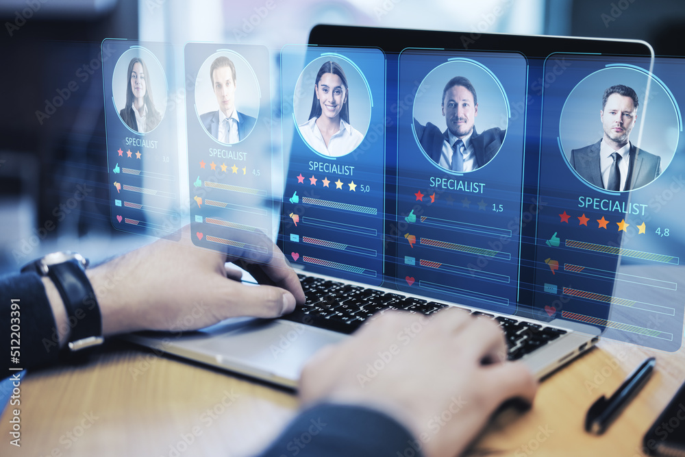 Poster Hiring employee and human resources concept with digital interface with candidate profiles from online specialists and professional marketplace on man hands typing on modern laptop keyboard