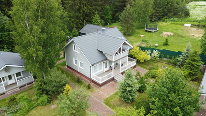 Fototapeta na wymiar Aerial photography of country house from quadrocopter