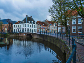 Fototapeta na wymiar Beautiful Dutch houses on canal side in Amersfoort, Netherlands