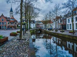 Traditional dutch houses on both sides of the canal in Amersfoort, Netherlands