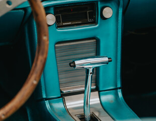Interior of a 1966 Ford Mustang. Automatic transmission selector. The Ford Mustang is a car...