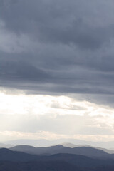 Fototapeta premium clouds over the mountains