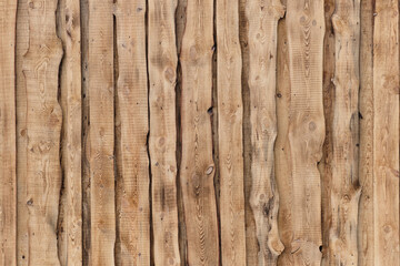 Background, burnt pine boards with a pronounced wood texture.