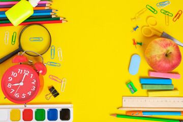 School supplies and stationery yellow background.Preparing child for school.