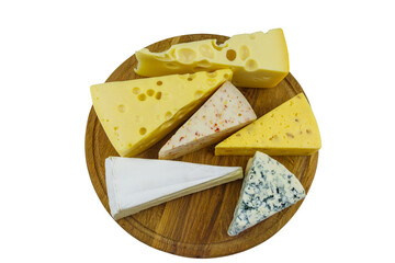 Set of various types of cheese on wooden cutting board isolated on white background. Top view