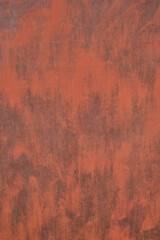 Background orange, sheet rusty and old metal.