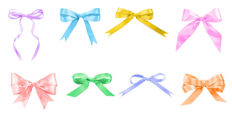 Set with different beautiful bows on white background