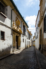 Romantyczna uliczka w Kordobie. - obrazy, fototapety, plakaty