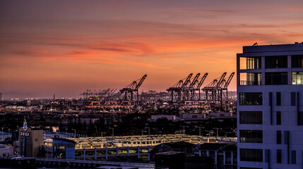 Hazy Industrial Shipping Port at Sunset