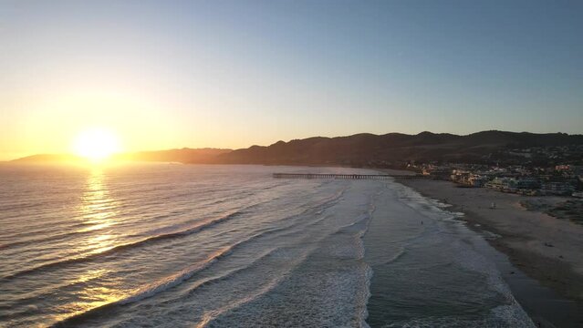 Aerial 4k video of Pismo Beach in Central California at sunset