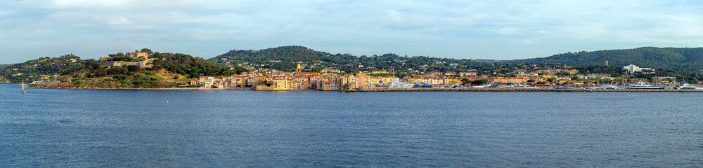 Fototapeta na wymiar Panoramic view of the Castle, old town and port at the Mediterranean city of Saint-Tropez, France on the Cote d'Azur coastline of the French Riviera.