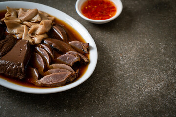 stewed duck offal in brown soup