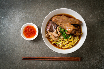 egg noodles with stewed and braised duck in brown soup