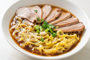 egg noodles with stewed duck in brown soup