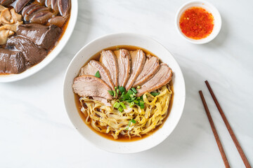 egg noodles with stewed duck in brown soup