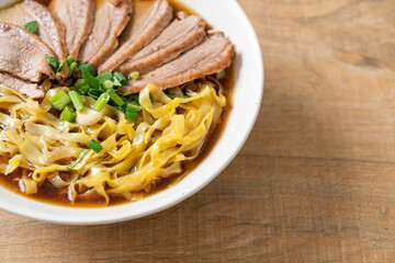 egg noodles with stewed duck in brown soup