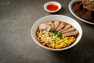 egg noodles with stewed duck in brown soup