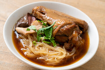 Braised duck noodles with brown soup