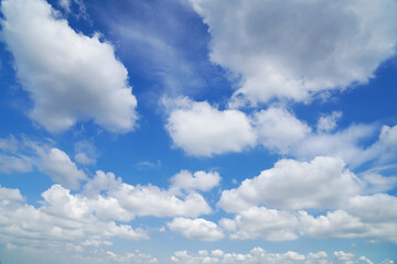 Naklejka na ściany i meble White clouds are floating in the blue sky