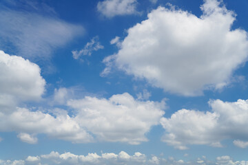 White clouds are floating in the blue sky