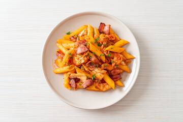 stir-fried penne pasta with kimchi and bacon