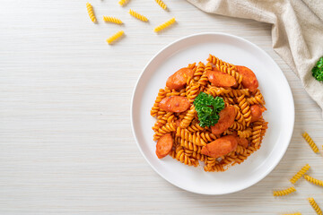 spirali or spiral pasta with tomato sauce