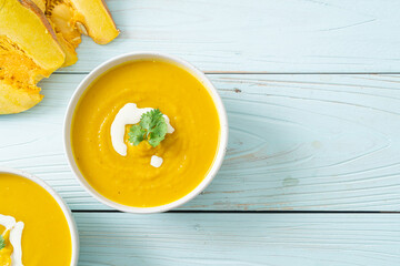 pumpkin soup in white bowl