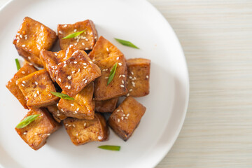 fried tofu with white sesame and teriyaki sauce
