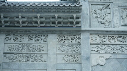The old Chinese architectures made by the bricks and decorated with the brick sculpture