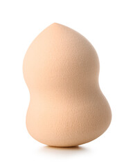 Beige makeup sponge on white background