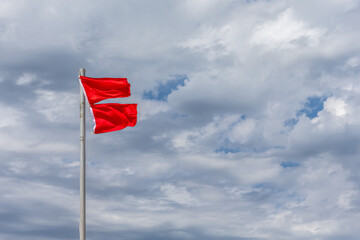 Double Red Flags Indicating Dangerous Beach Conditions