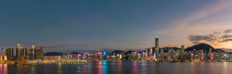 Fototapeta na wymiar Scenery of panorama of Victoria harbor of Hong Kong city at dusk
