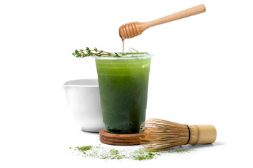 ice green tea honey with matcha powder, Matcha bamboo whisk and Honey dipper isolated on white...