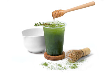 ice green tea honey with matcha powder, Matcha bamboo whisk and Honey dipper isolated on white...