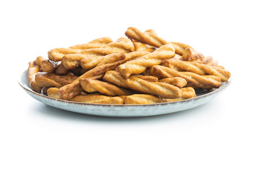 Salted pretzel sticks. Salted crackers isolated on white background.