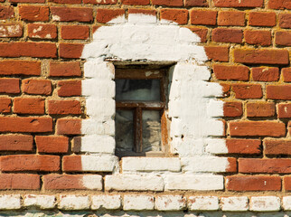 old brick wall with a window