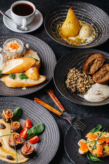 Close up image of a dinner table. Meat, salads, icecream dessert and coffee
