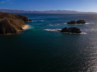 Beautiful aerial view of Costa Rica Beach Playa Rajada in Cuajiniquil Guanacaste in magical yellow sunset