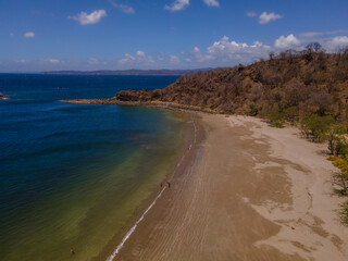 Beautiful aerial view of Costa Rica Beach Playa Rajada in Cuajiniquil Guanacaste in magical yellow sunset