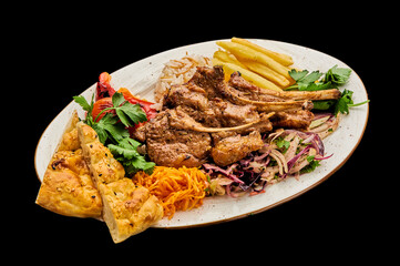 Juicy bbq burger with cheese, tomatoes, red onion, cucumber lies on a blue plate on a black isolated background