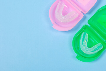 orthodontic silicone simulator. tray for teeth in a case Invisible leveling brackets. Mobile orthodontic appliance for teeth correction. The concept of dentistry, orthodontics