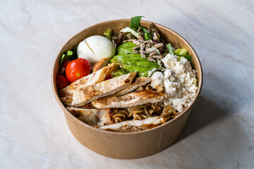 Healthy Protein Food Bowl with Chicken, Avocado, Egg, Cheese and Greens Salad for Athlete Fitness Sports