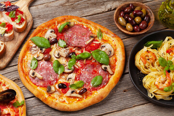 Italian cuisine. Pizza, pasta and toasts