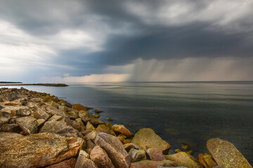 storm clouds and rain, sunset by the Baltic Sea in Poland