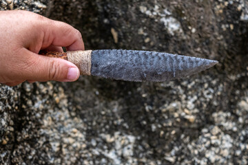 Stone Age hand-made obsidian knife art of stone knife